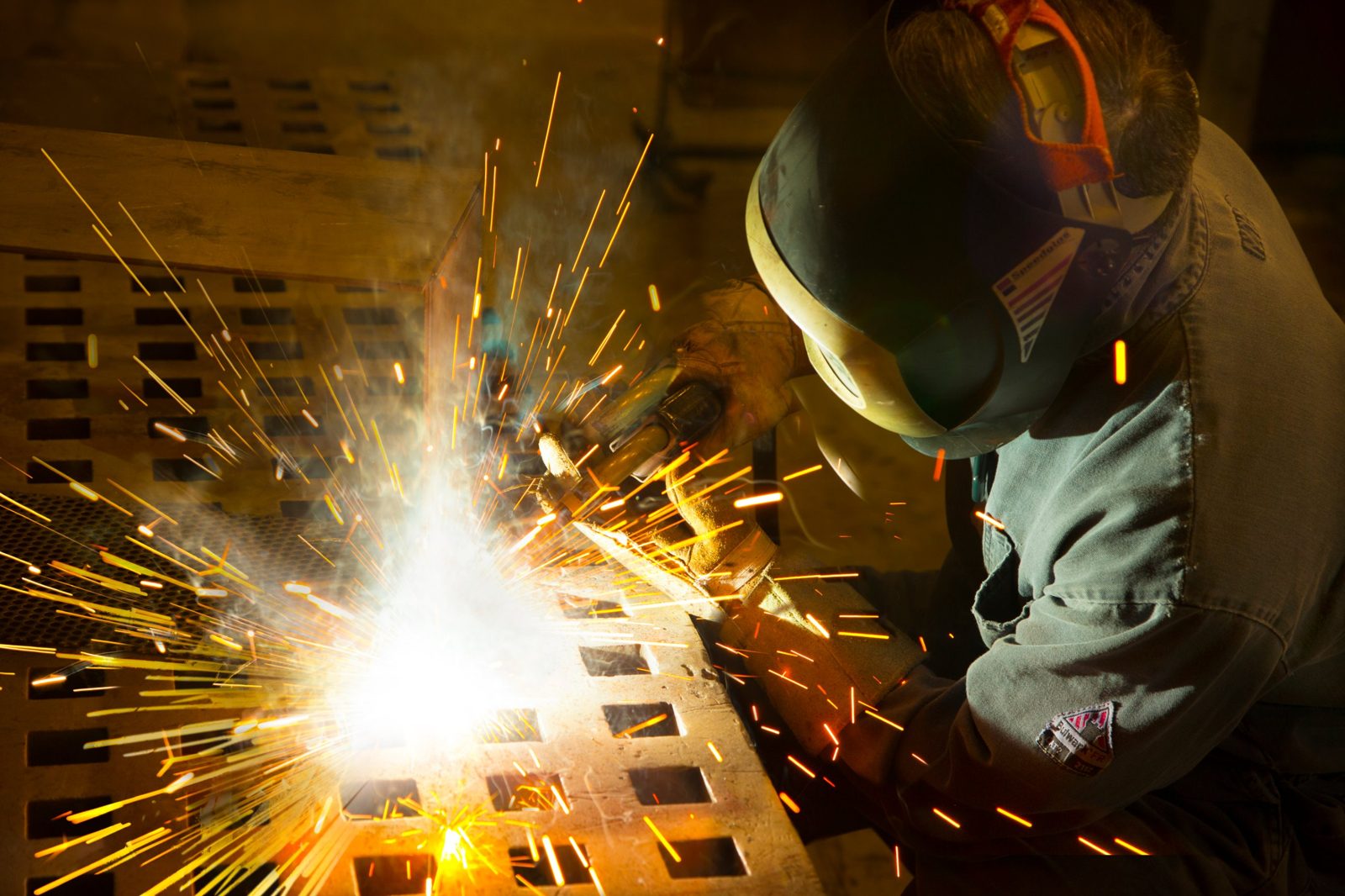 MSC welder at work, sparks flying