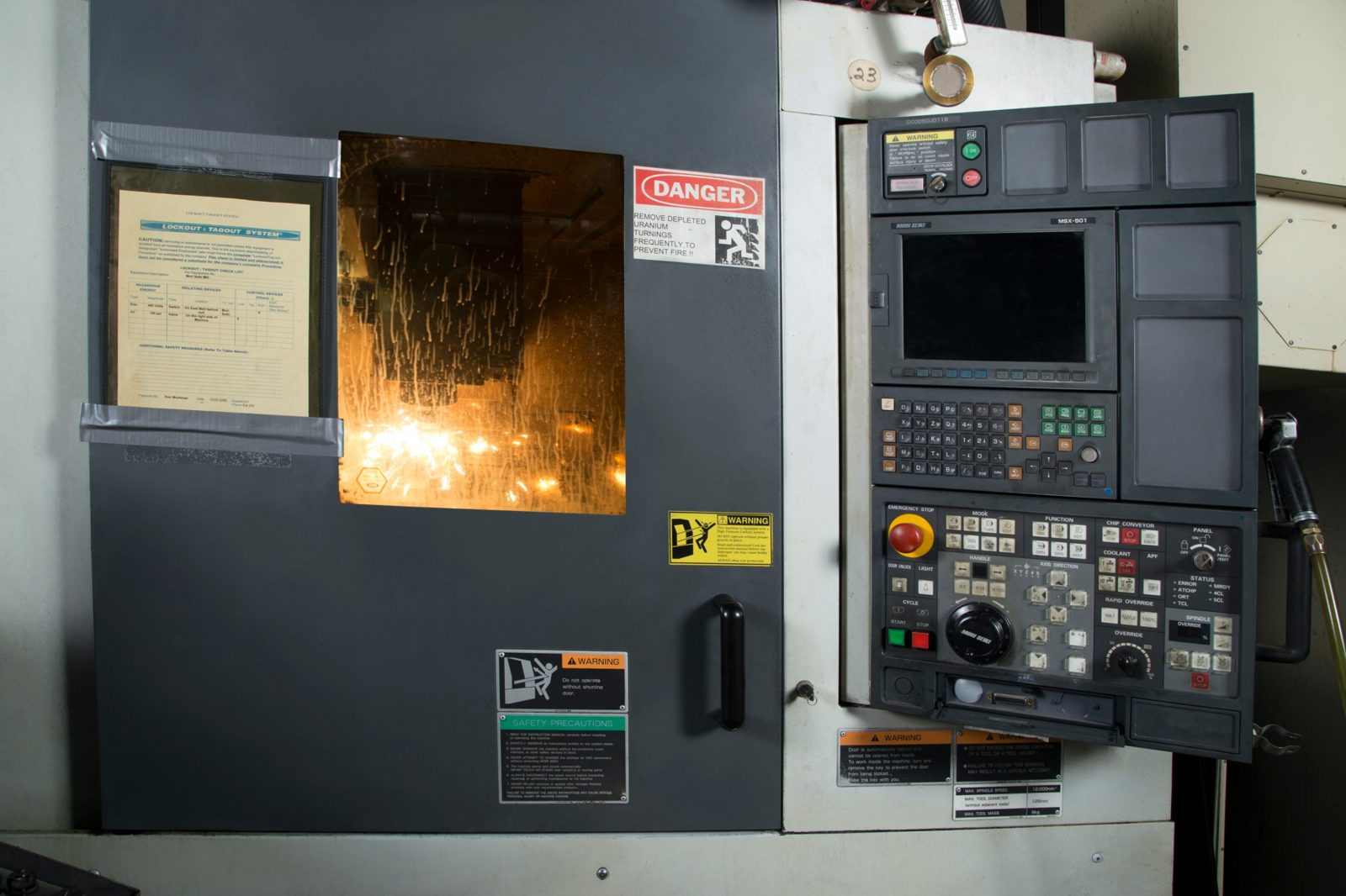 CNC machining center cutting a part