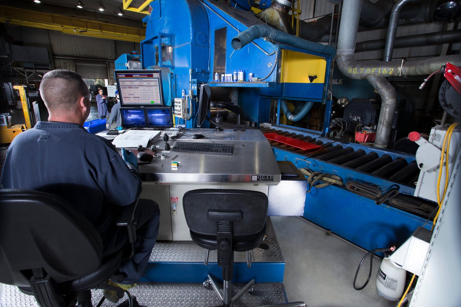 Operator at the rolling mill control station